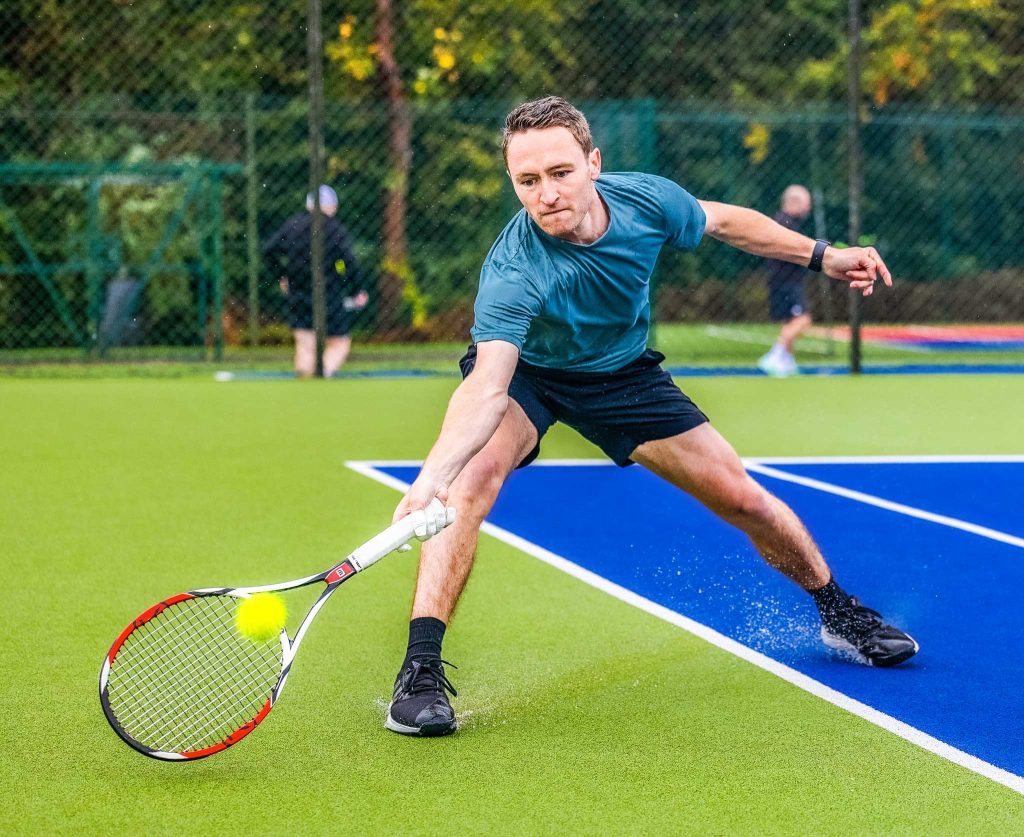 Chris Czermak hitting a forehand with the Wilson K Factor Six One Tour 90 tennis racket